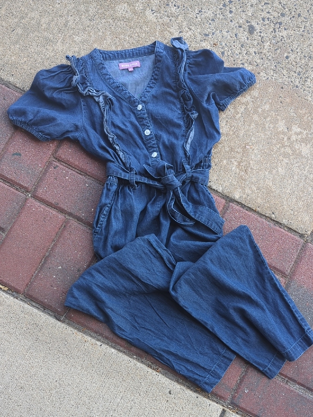BCBGirls Button Up Denim Ruffle-Trim Jumpsuit